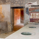 Remains of an ancient home with snack bar in Pompeii